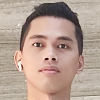 A professional headshot of the website creator